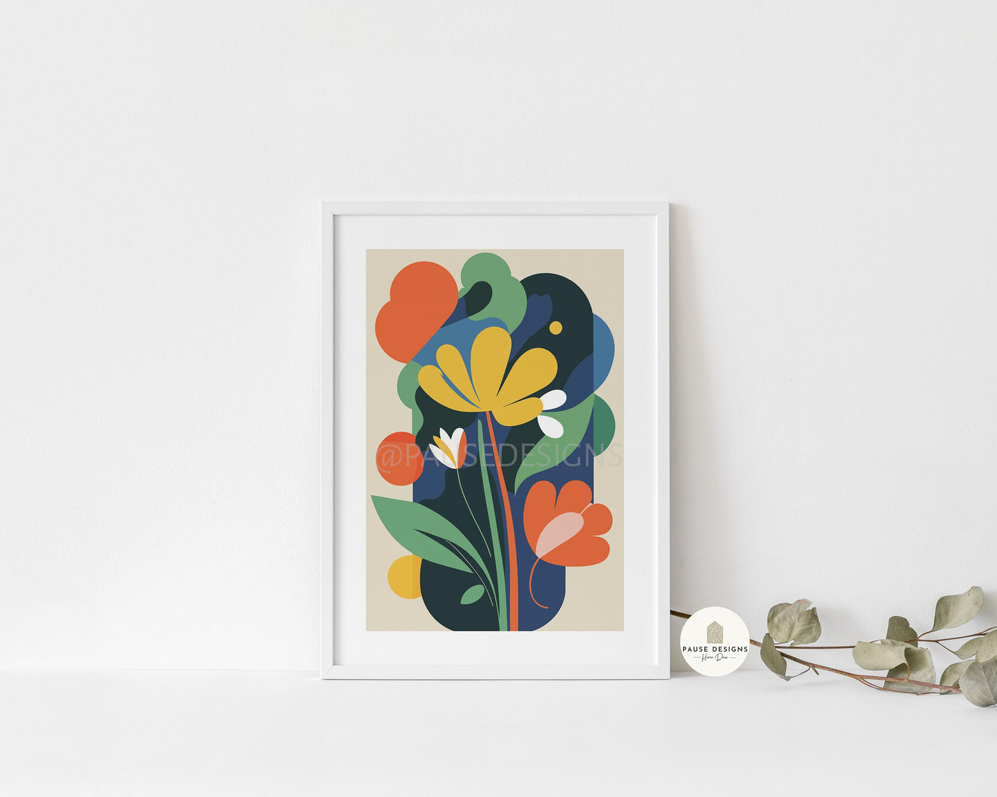 a picture of a flower on a shelf