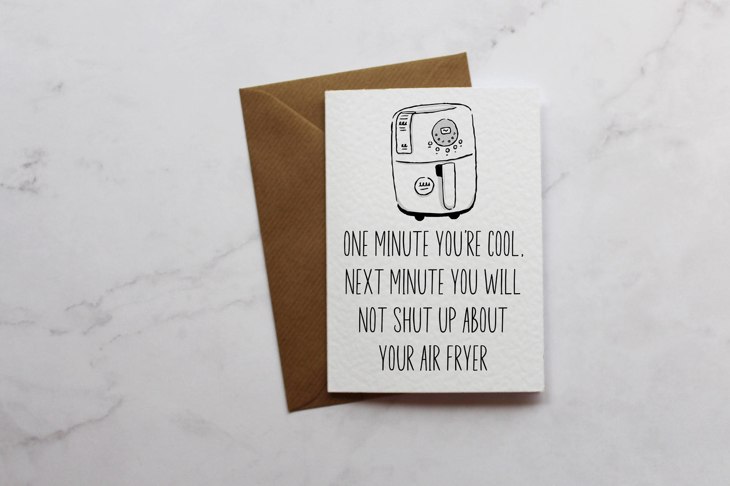a card with a drawing of a toaster on it