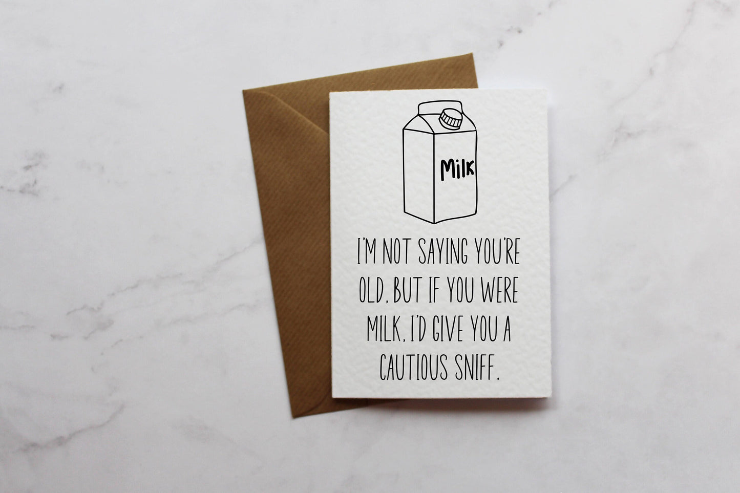a card with a milk carton on it