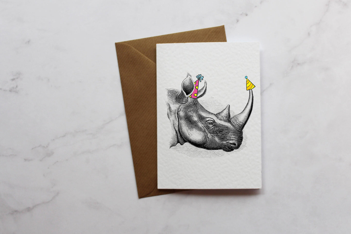 a card with a drawing of a rhino on it