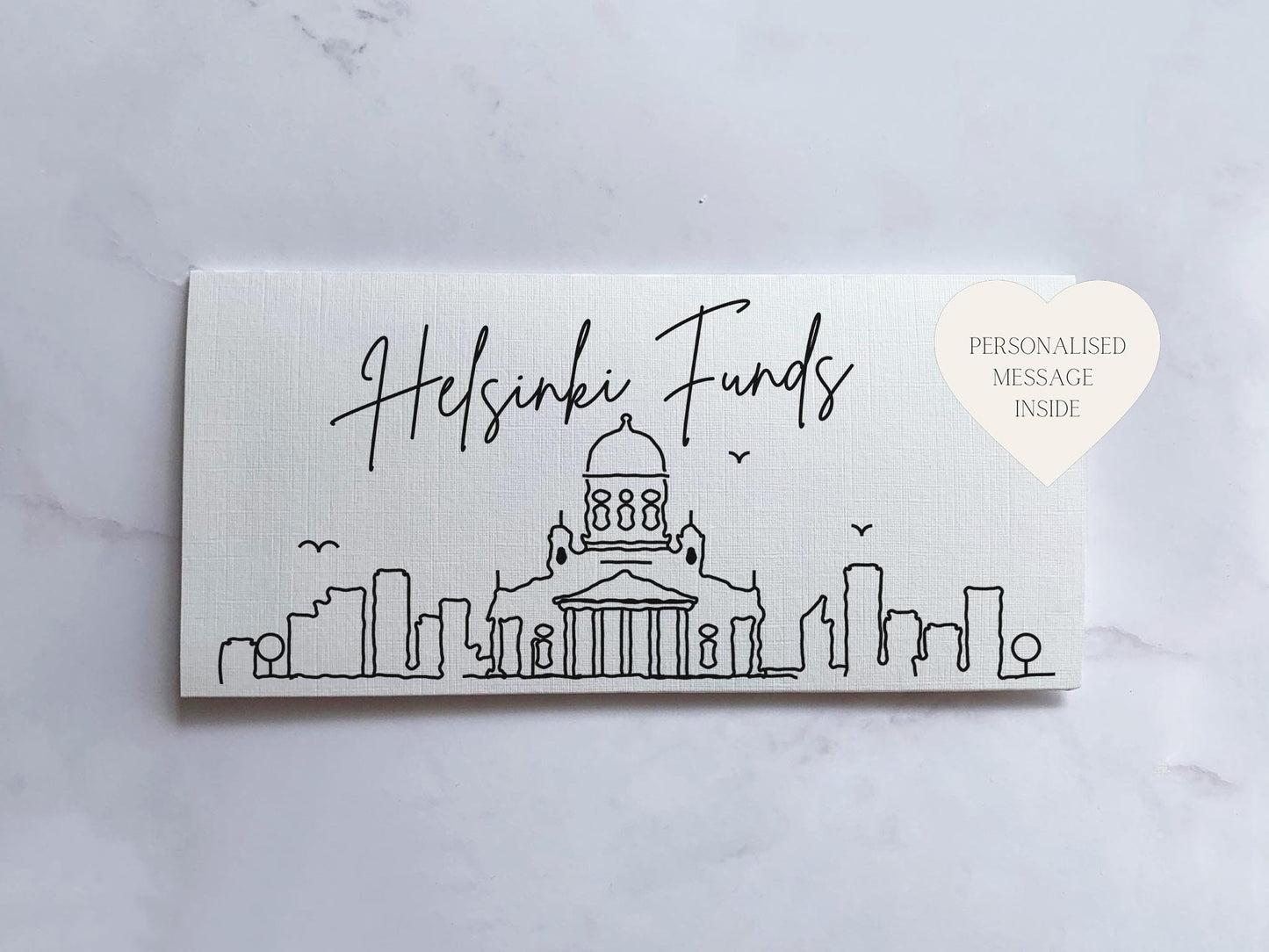 a white business card with a picture of a building