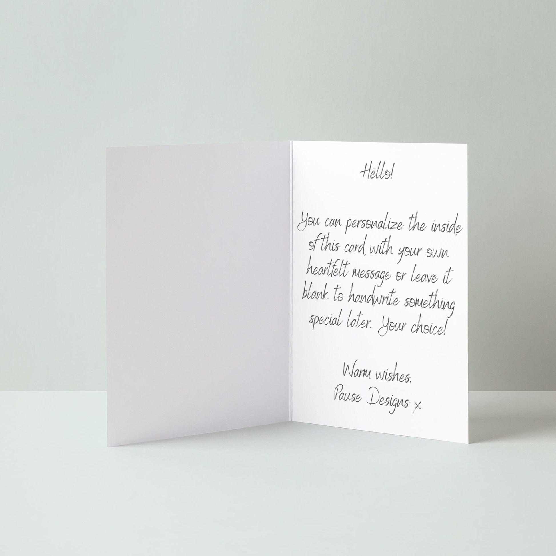 The image is a blank greeting card with a handwritten message welcoming the recipient.