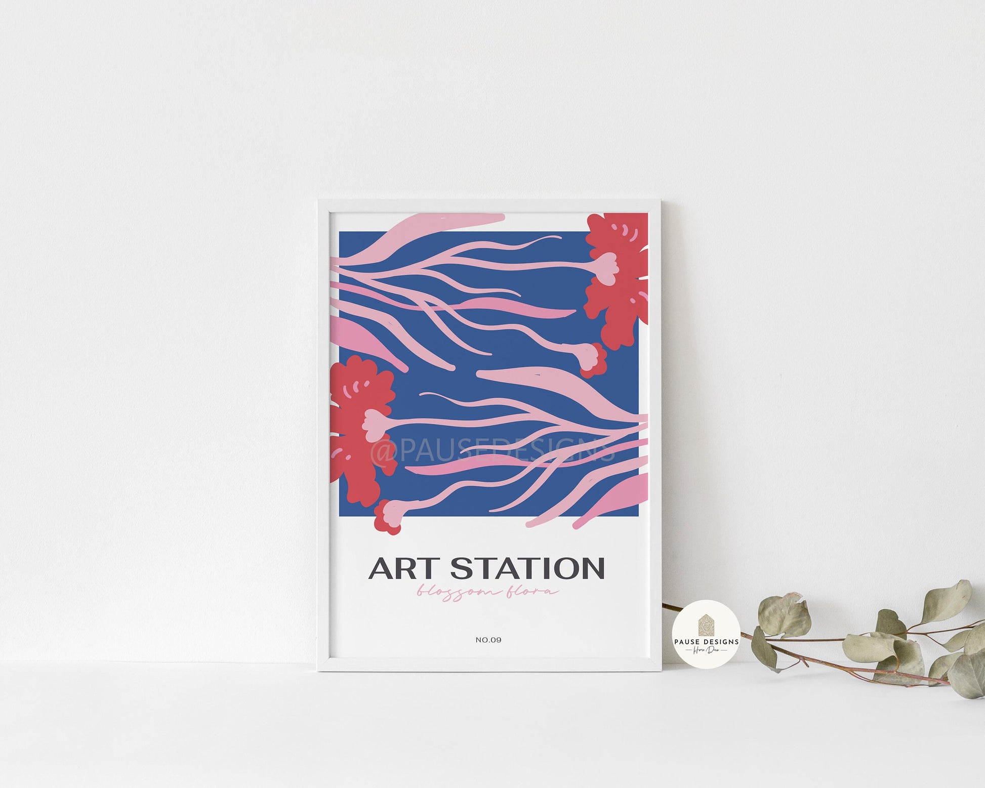 a picture of an art station next to a plant