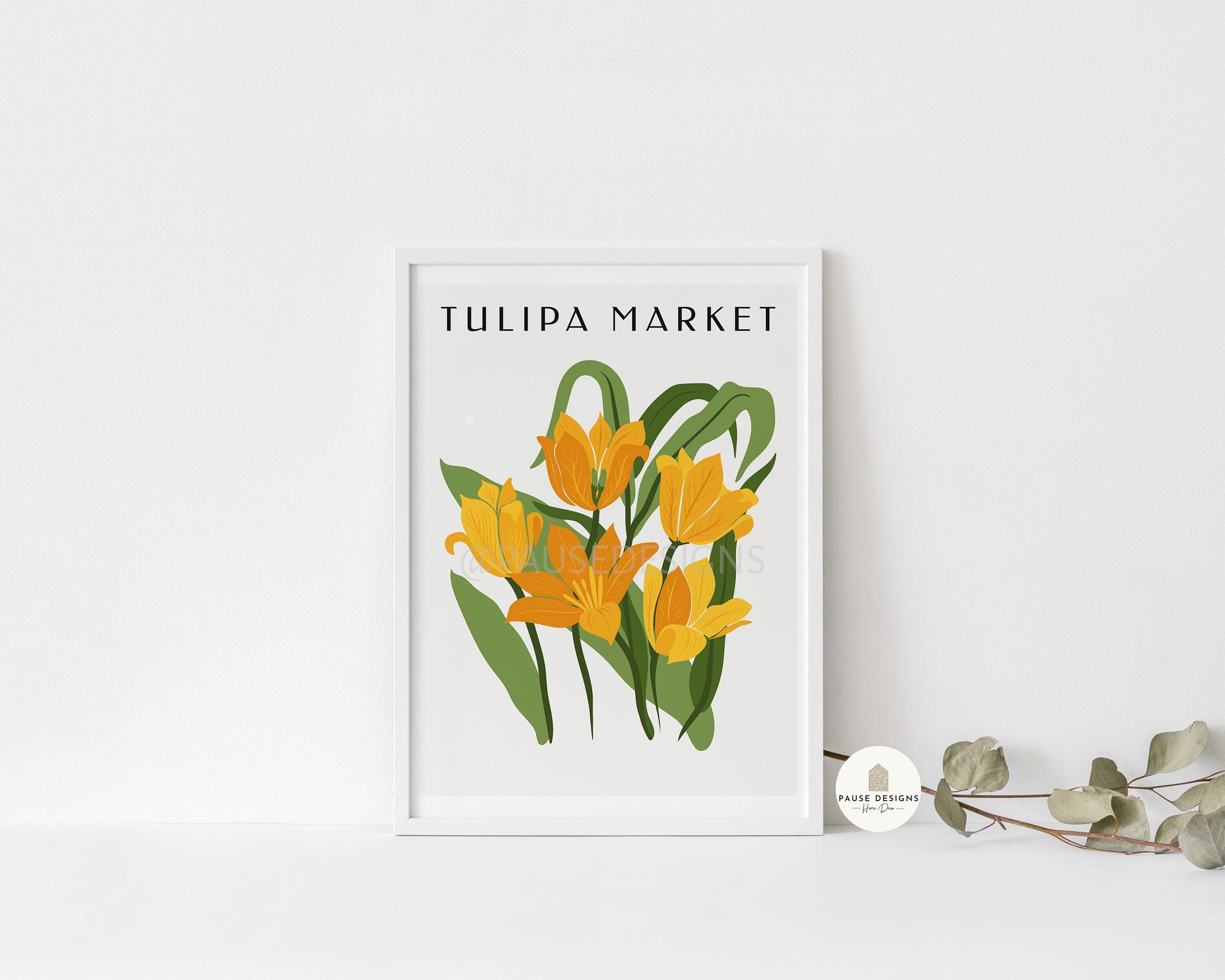 a picture of tulips in a white frame