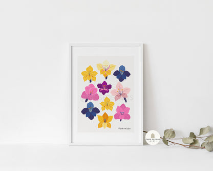 a picture of a bunch of flowers in a white frame