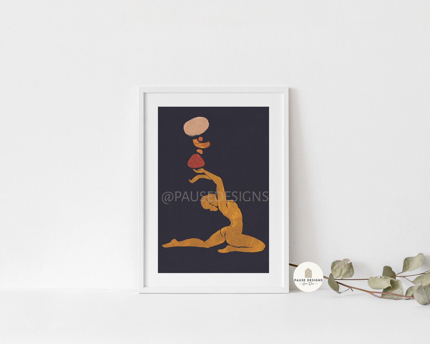 a framed picture of a woman doing yoga