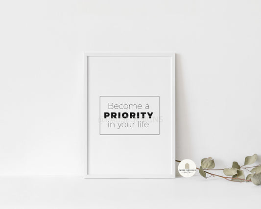 a picture frame sitting on top of a shelf next to a plant