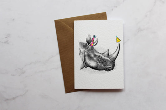 a card with a drawing of a rhino on it