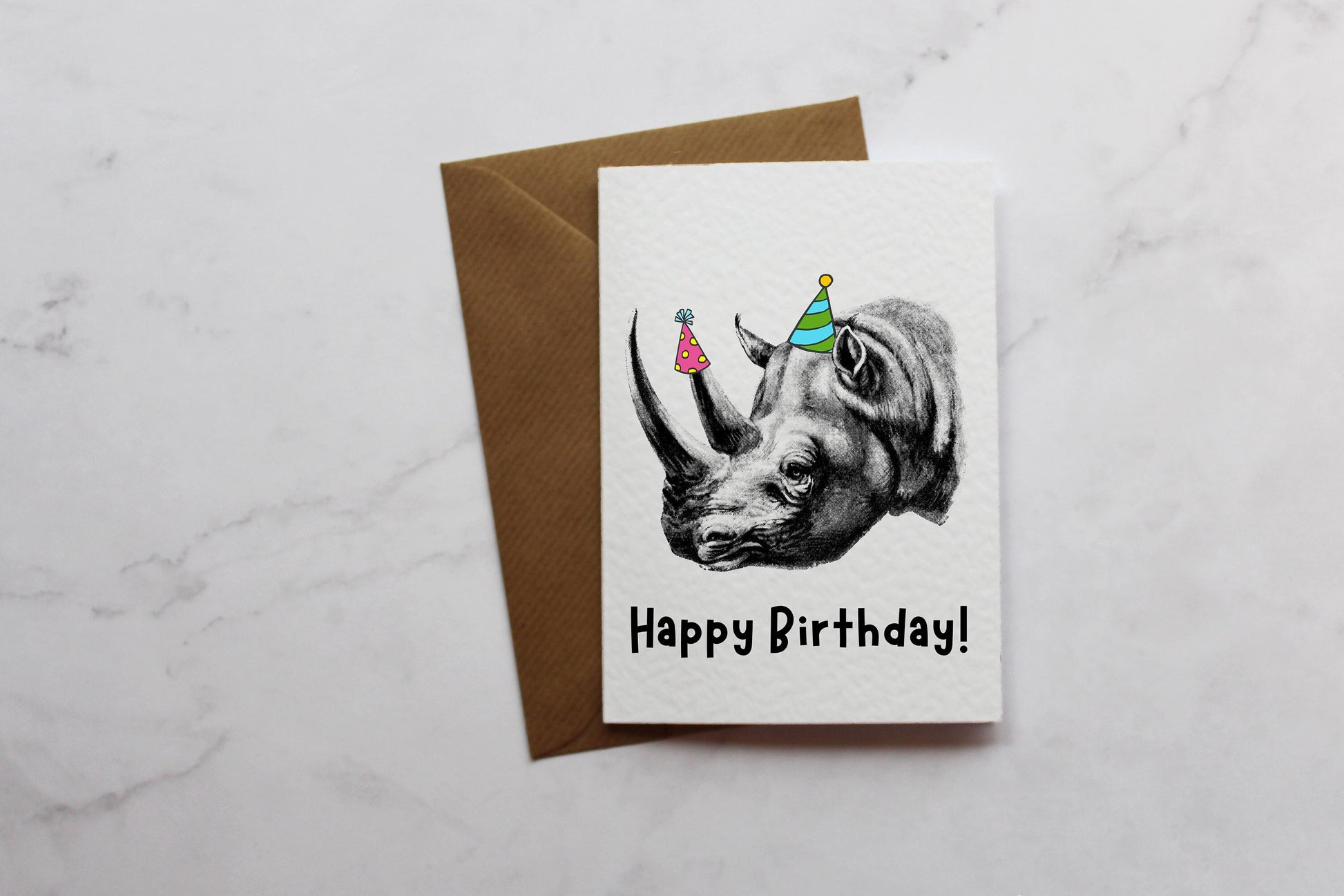 a happy birthday card with a picture of a rhino