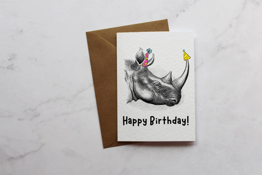 a card with a drawing of a rhino on it