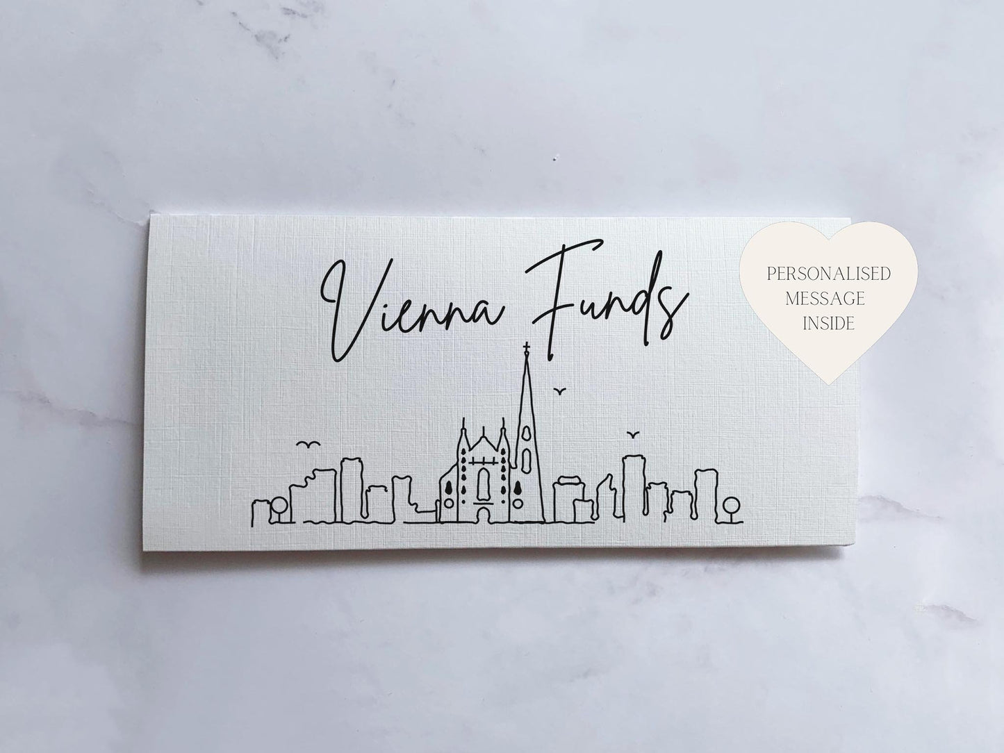 a business card with a picture of a city