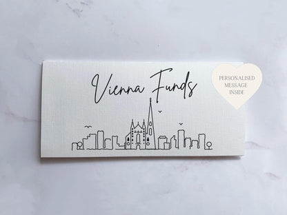 a business card with a picture of a city