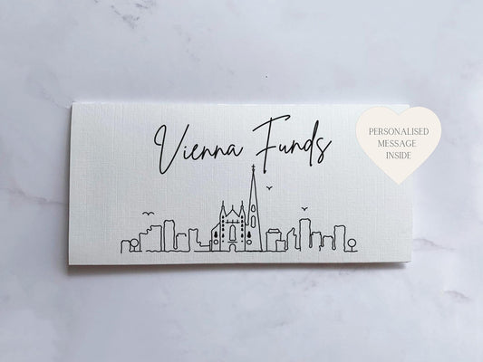 a business card with a picture of a city