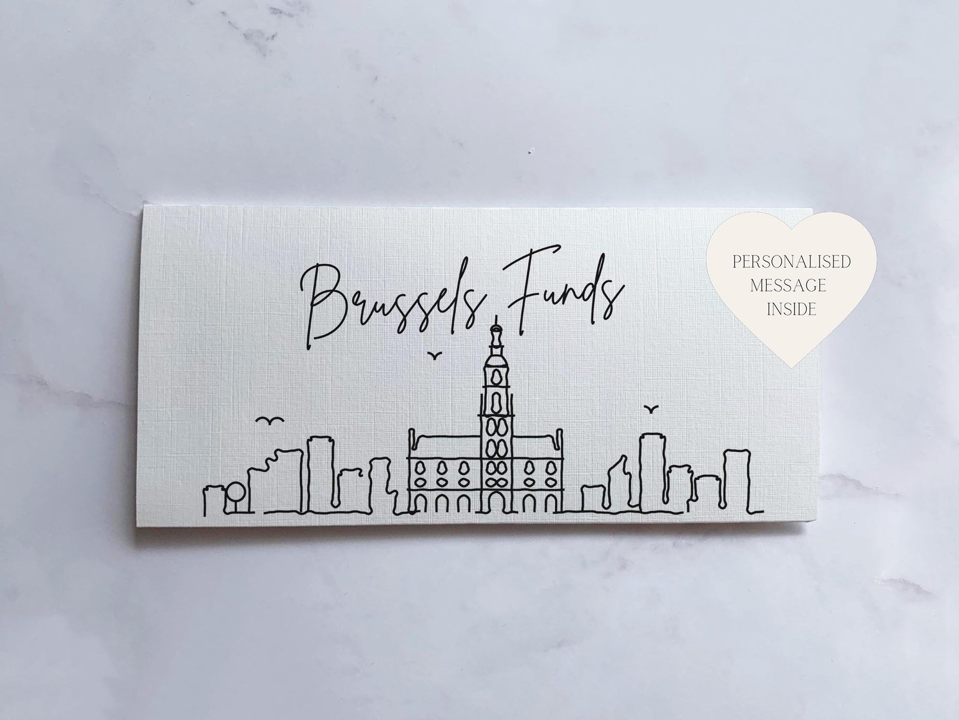 a business card with a picture of a city