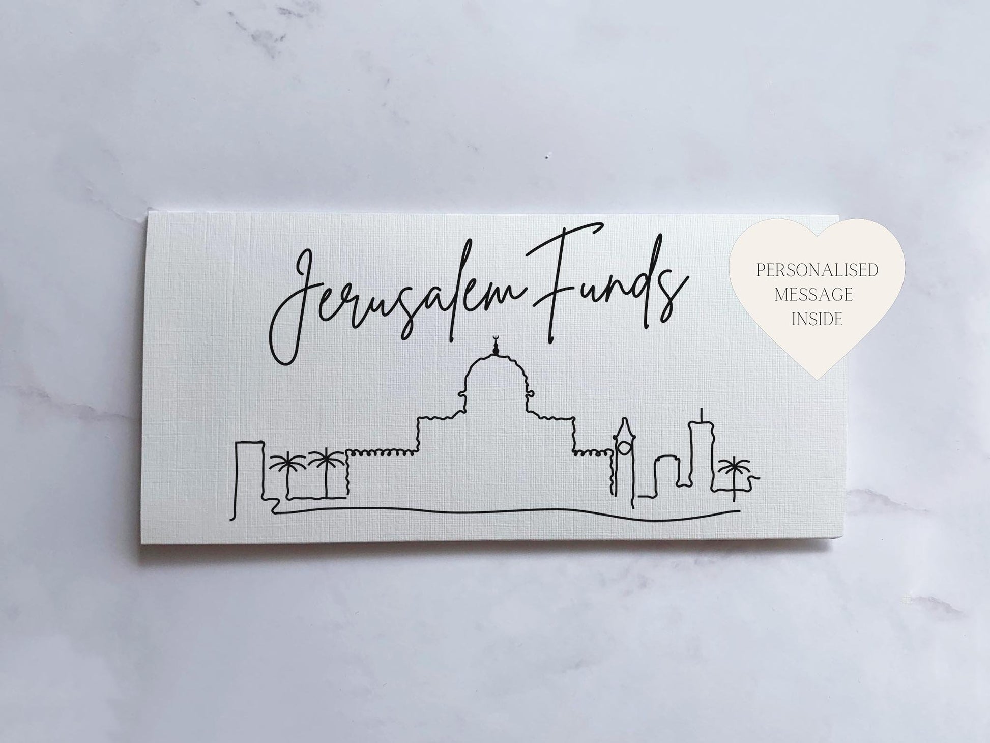 a white business card with a picture of a city