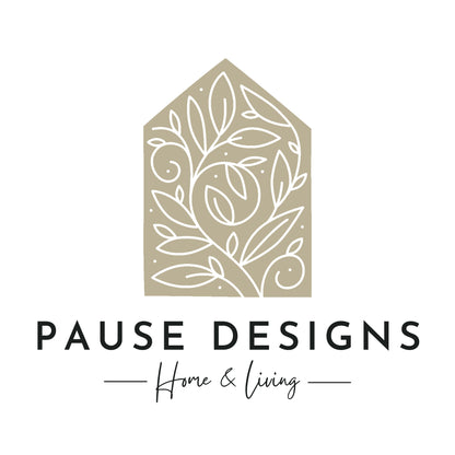 the logo for pause designs home and living