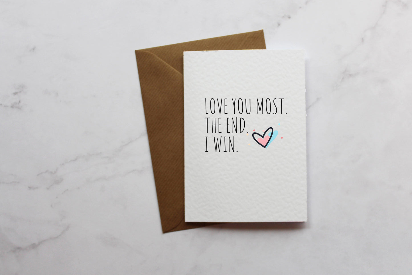 a card that says love you most the end i win