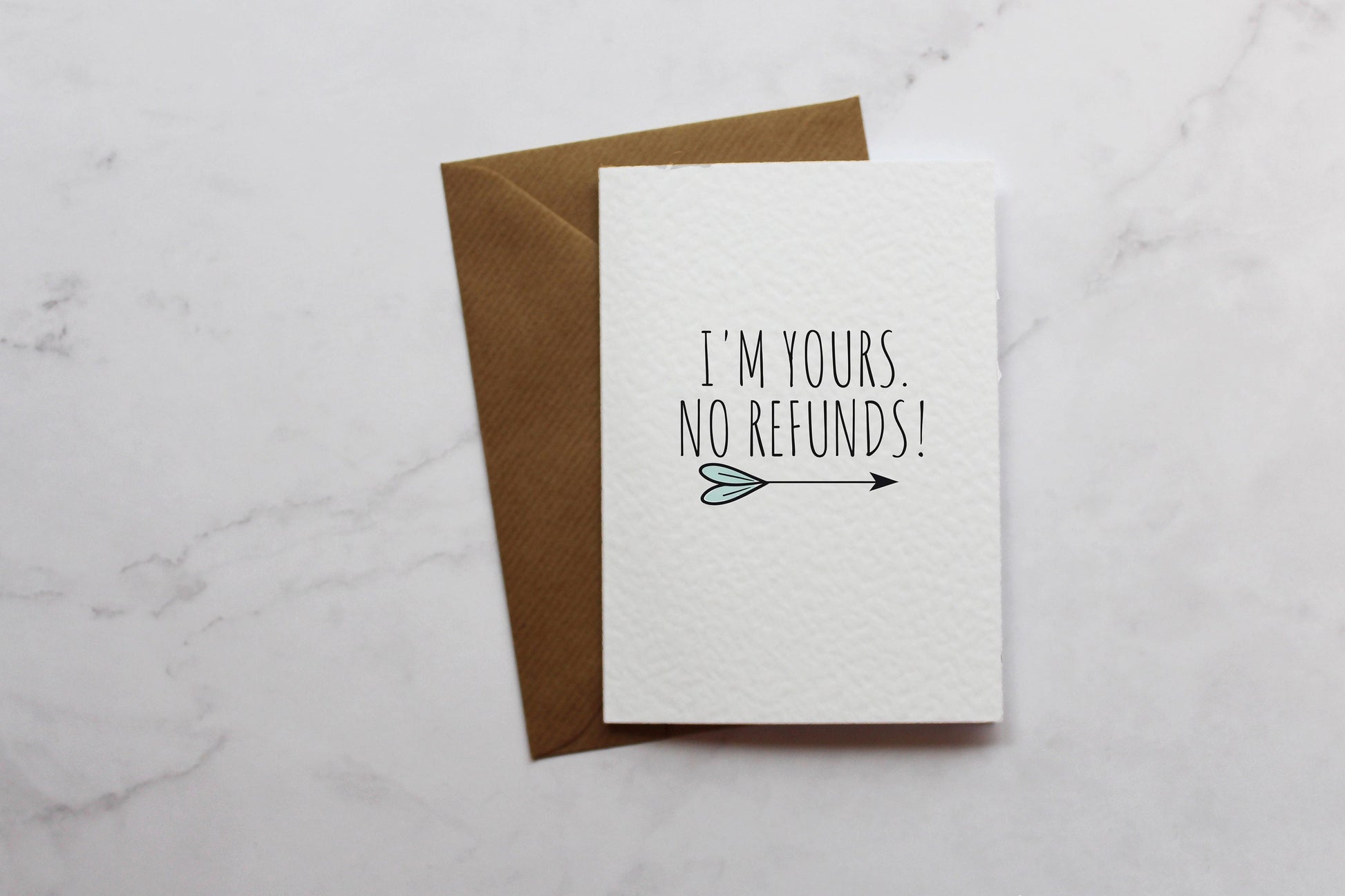 a card that says i&#39;m yours, no returns