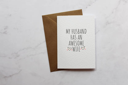 a card that says, my husband has an awesome wife