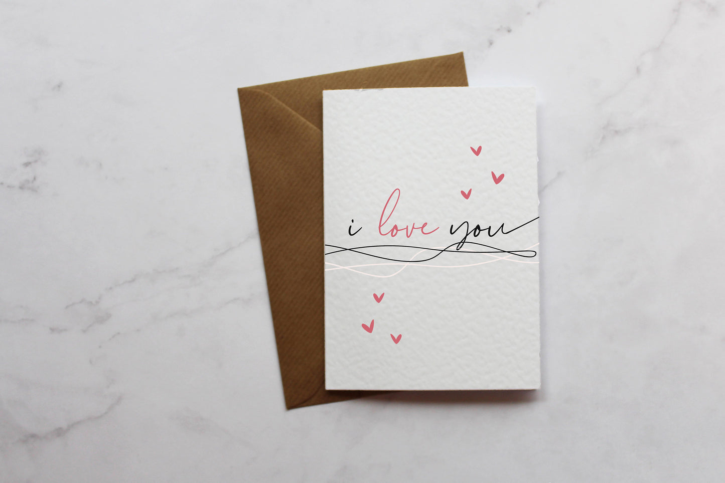 a card with the words i love you written on it